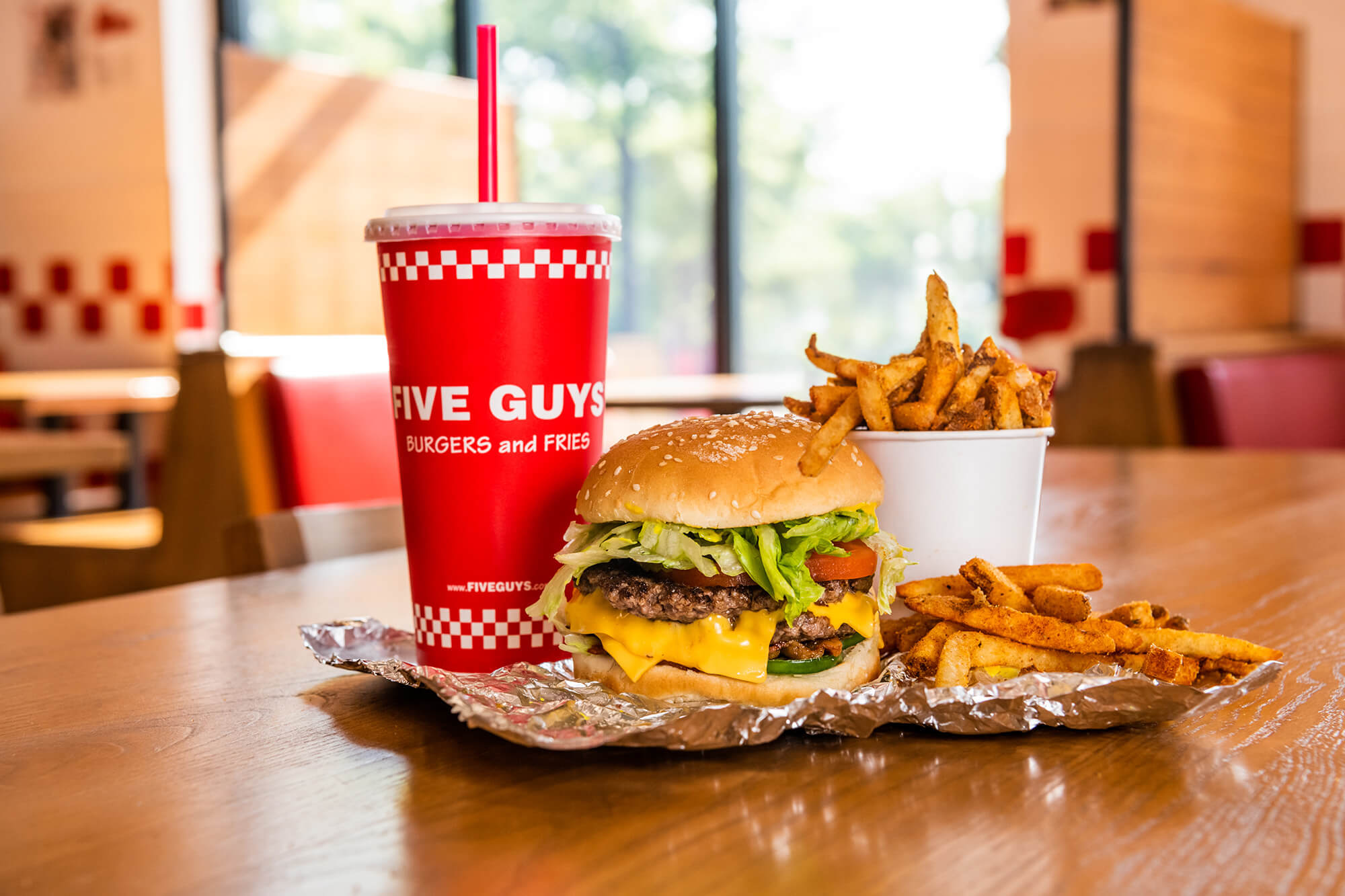 A burger, fries and milkshake